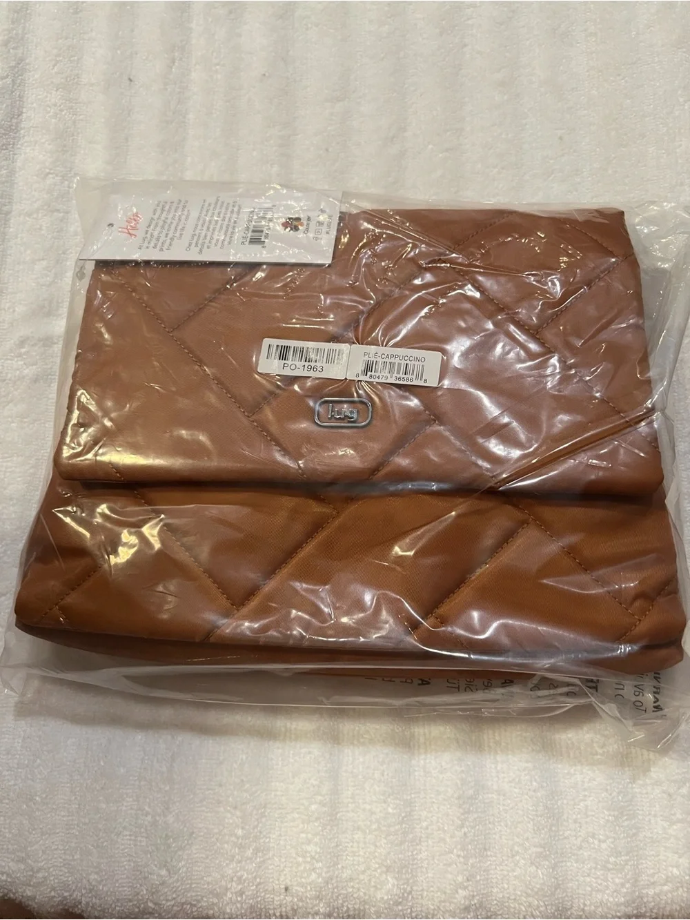 lug Quilted Crossbody Bag in Tan